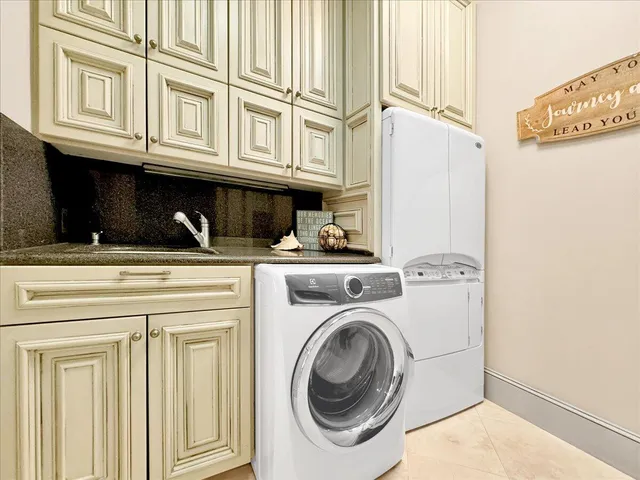 a view of a house with backyard porch and sitting area