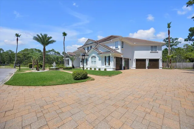 a living room with fireplace furniture and a wooden floor