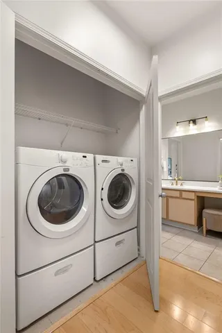 a utility room with dryer and washer