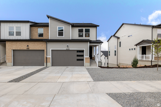 4806 Heartwood Road, Unit 425 Mapleton, UT 84664 - Photo 1 of 1 View of front of property with an attached garage, driveway, and brick siding