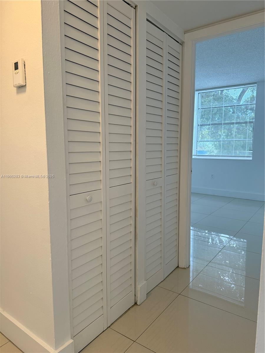 9460 Fontainebleau Boulevard, Unit 331 Miami, FL 33172 - Photo 16 of 17 a view of bathroom with shower