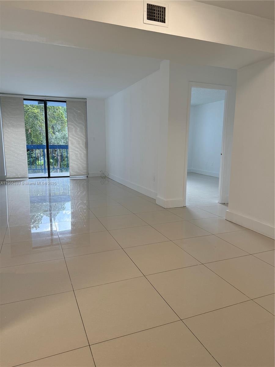 9460 Fontainebleau Boulevard, Unit 331 Miami, FL 33172 - Photo 17 of 17 a view of an empty room with a window