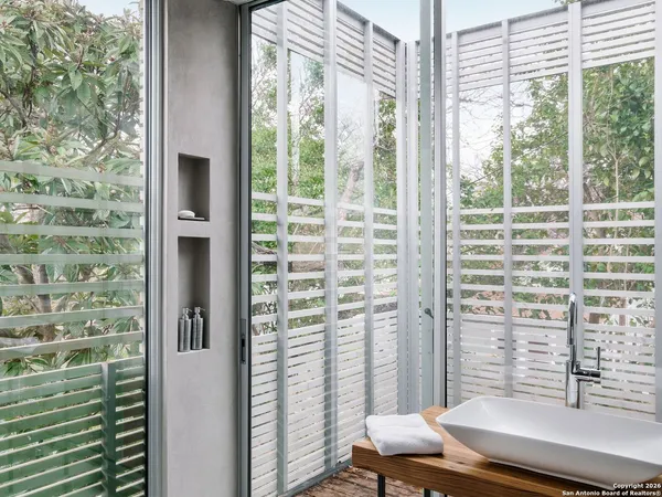 a view of a room with windows