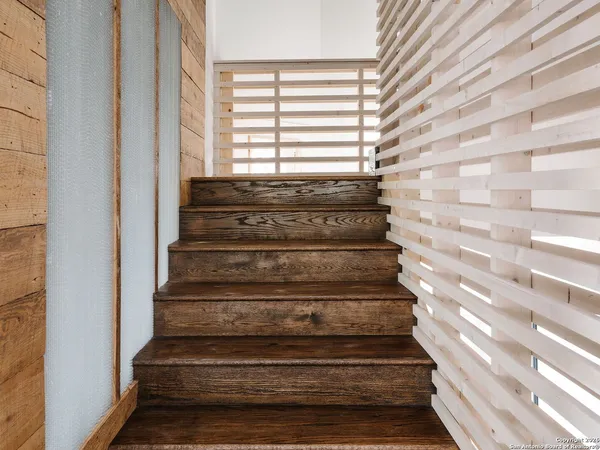 a view of entryway with wooden floor