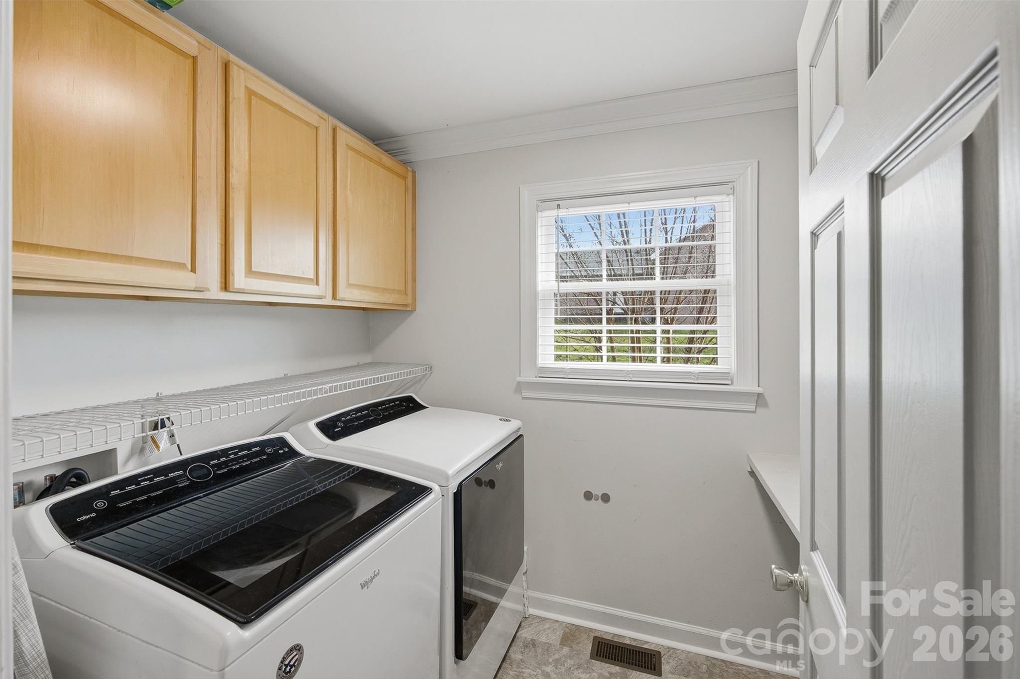 2553 Genes Loop Morganton, NC 28655 - Photo 18 of 32 a utility room with dryer and washer