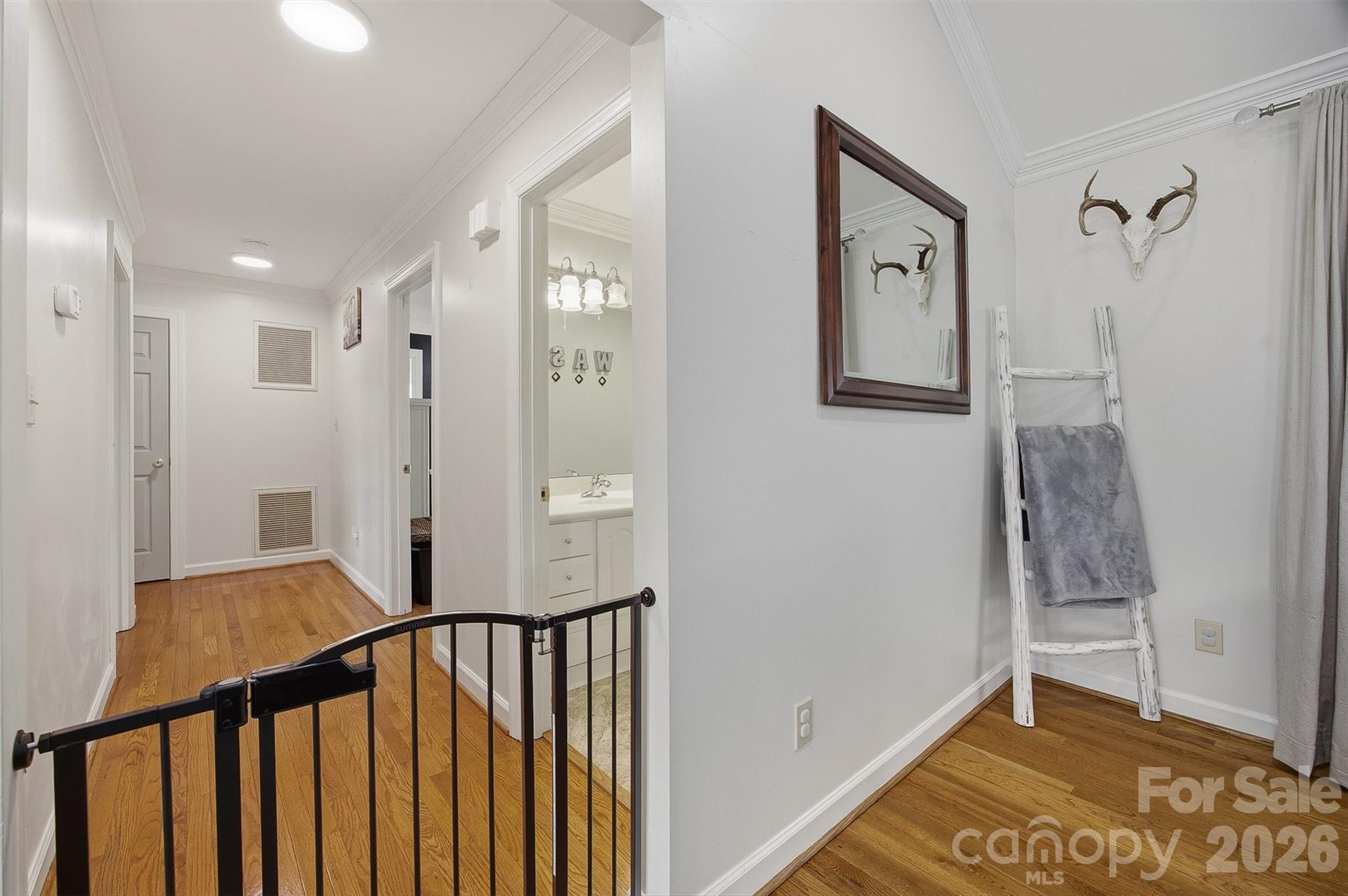 2553 Genes Loop Morganton, NC 28655 - Photo 20 of 32 a view of a hallway with a bathroom