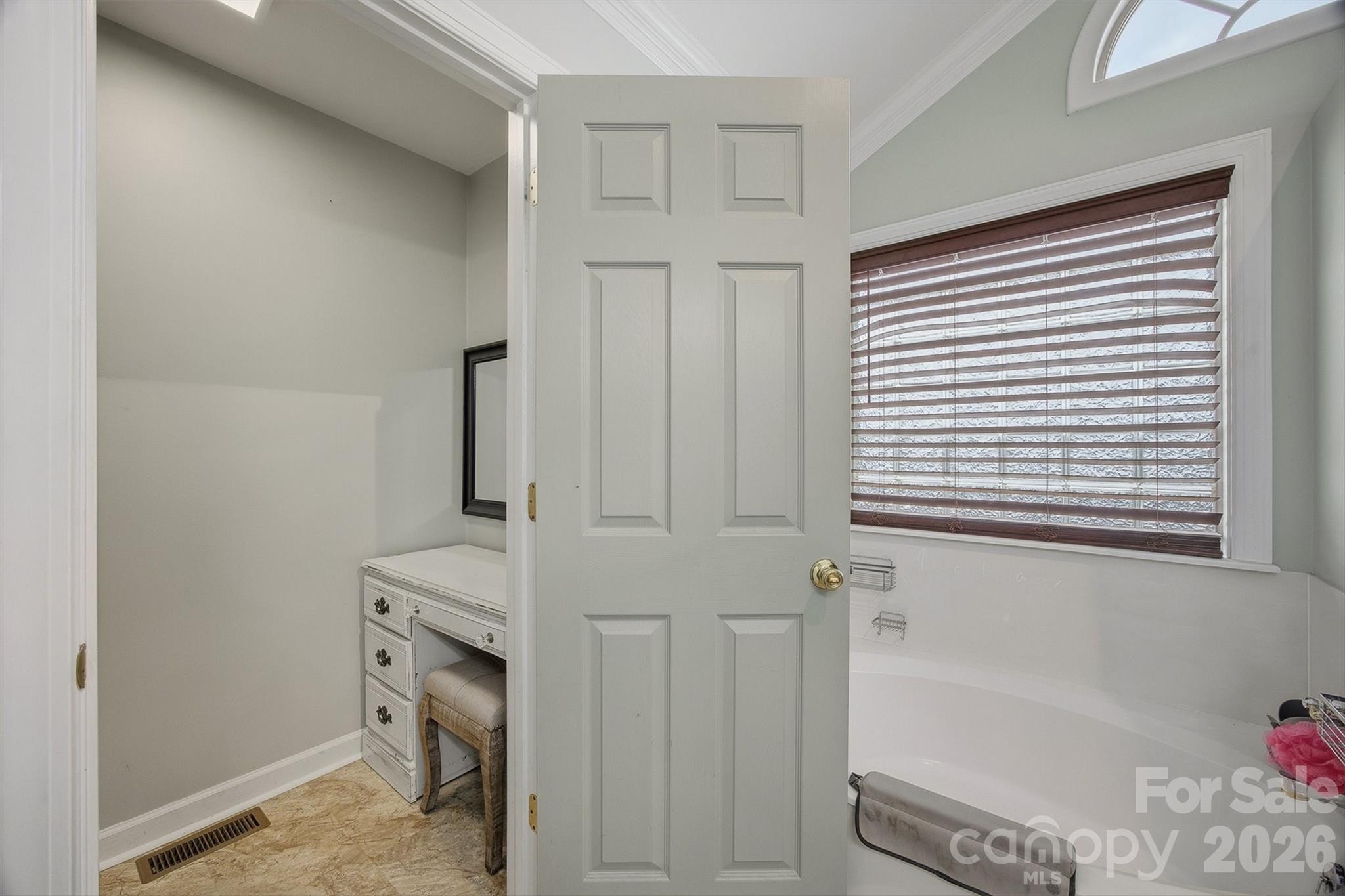 2553 Genes Loop Morganton, NC 28655 - Photo 26 of 32 a bathroom with a bathtub sink and window