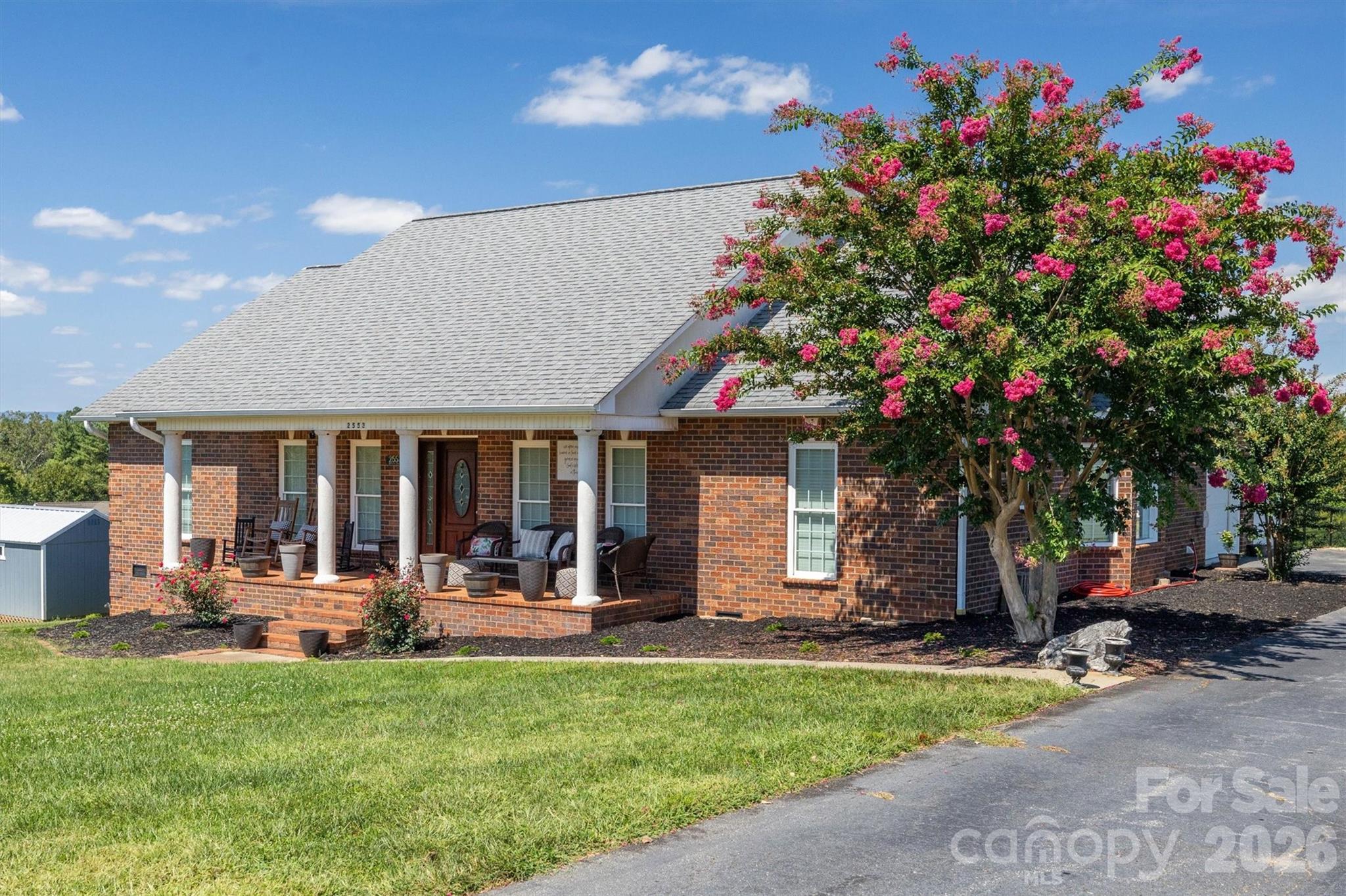 2553 Genes Loop Morganton, NC 28655 - Photo 3 of 32 a view of a house with backyard and sitting area