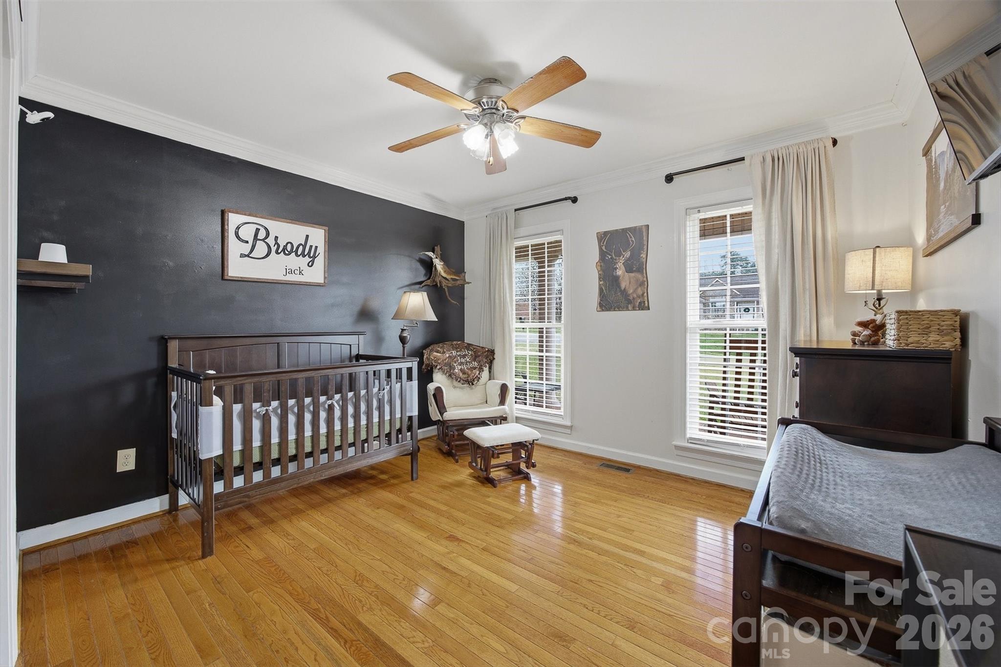 2553 Genes Loop Morganton, NC 28655 - Photo 7 of 32 a living room with furniture and a wooden floor