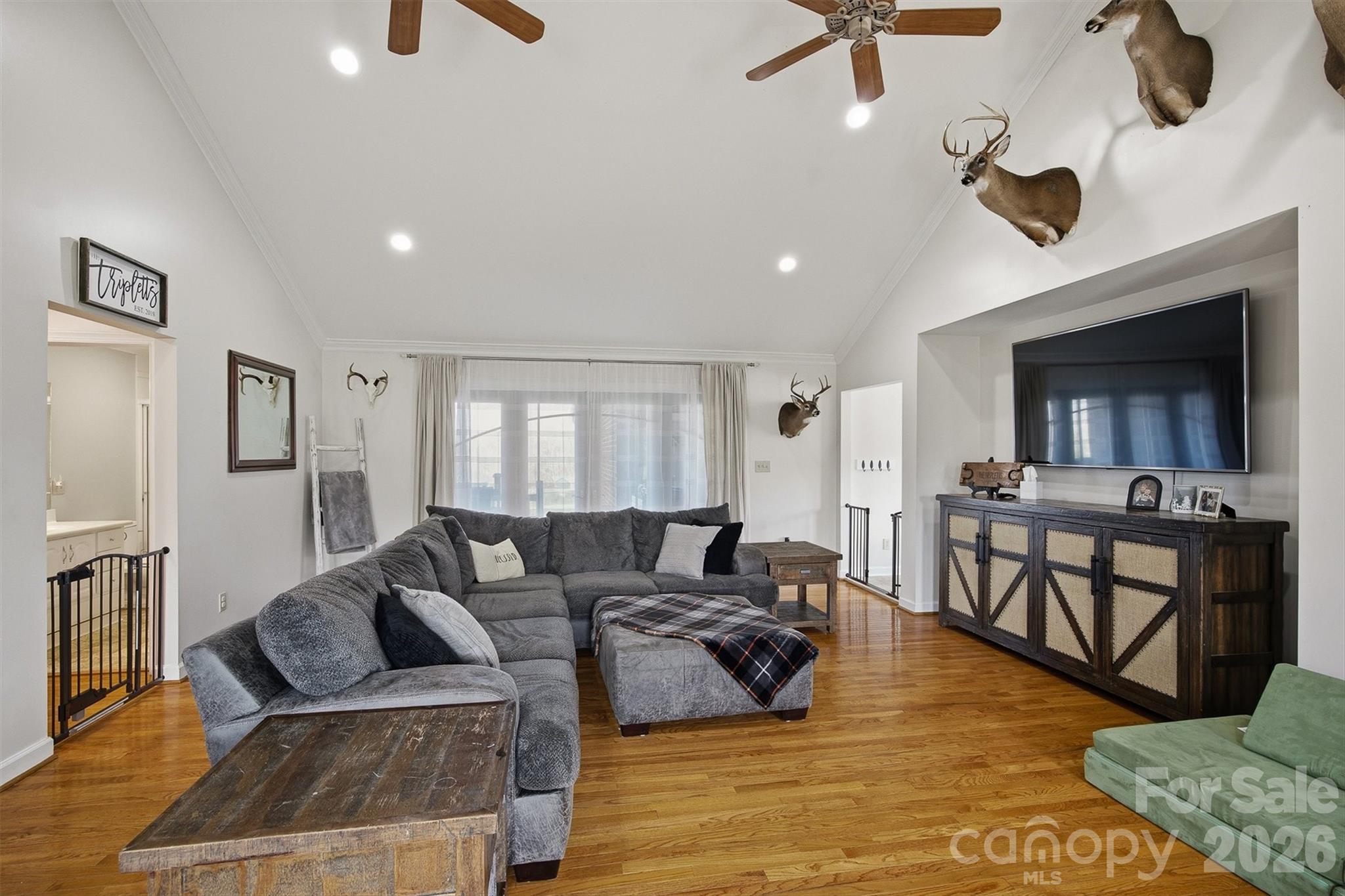 2553 Genes Loop Morganton, NC 28655 - Photo 8 of 32 a living room with furniture and a wooden floor