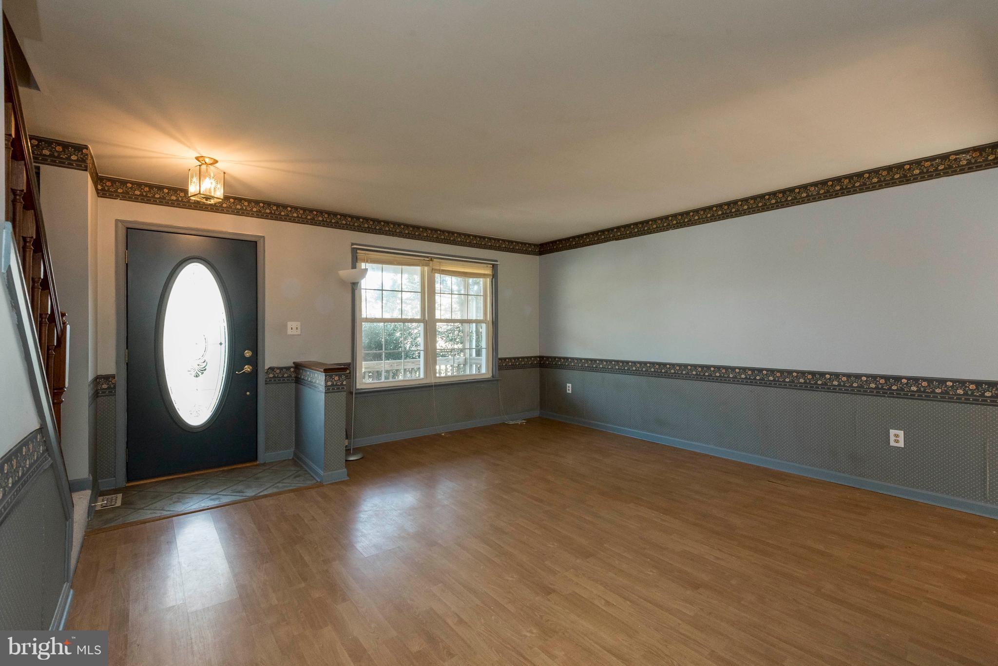 7951 Elizabeth Road Pasadena, MD 21122 - Photo 3 of 27 Spacious living room and open layout