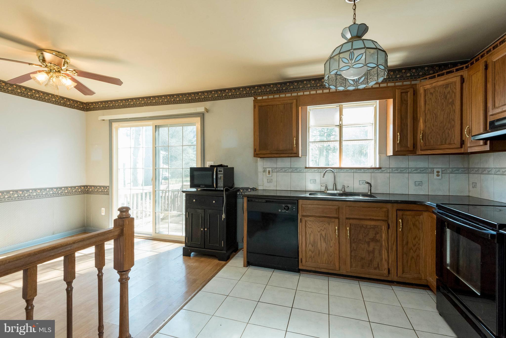 7951 Elizabeth Road Pasadena, MD 21122 - Photo 8 of 27 Kitchen has great space with granite countertops