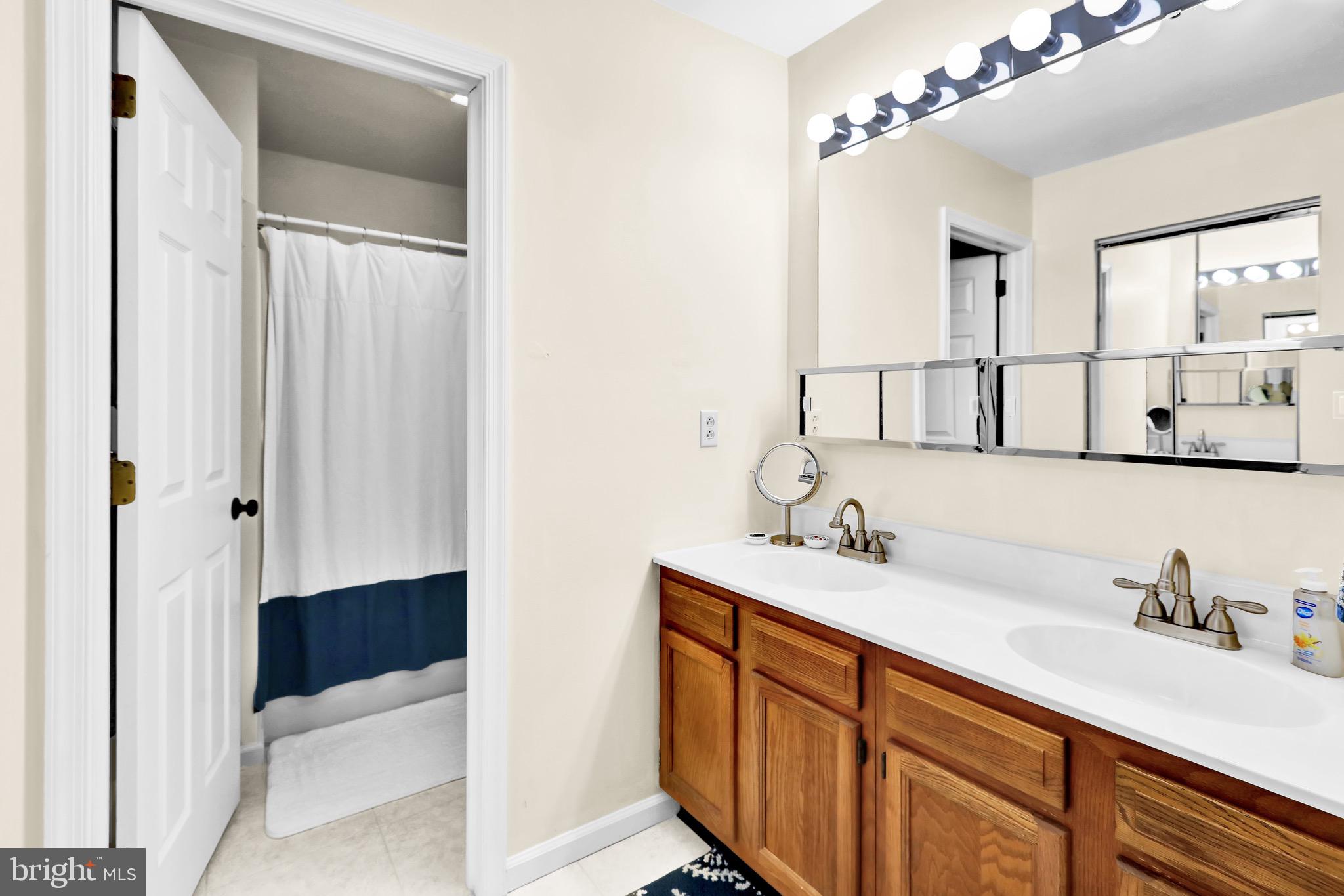 237 North 14th Street Reading, PA 19604 - Photo 18 of 26 a bathroom with a sink and a mirror