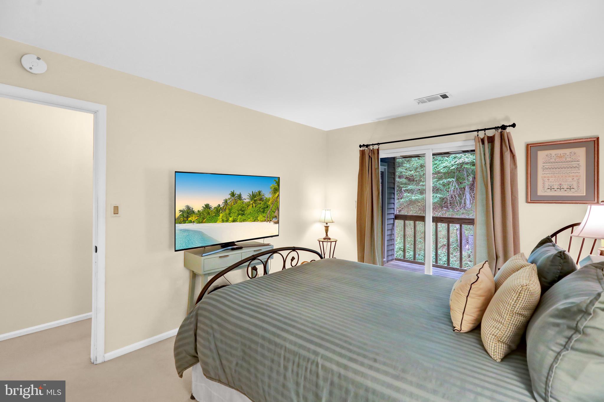 237 North 14th Street Reading, PA 19604 - Photo 21 of 26 a bedroom with a bed and a window
