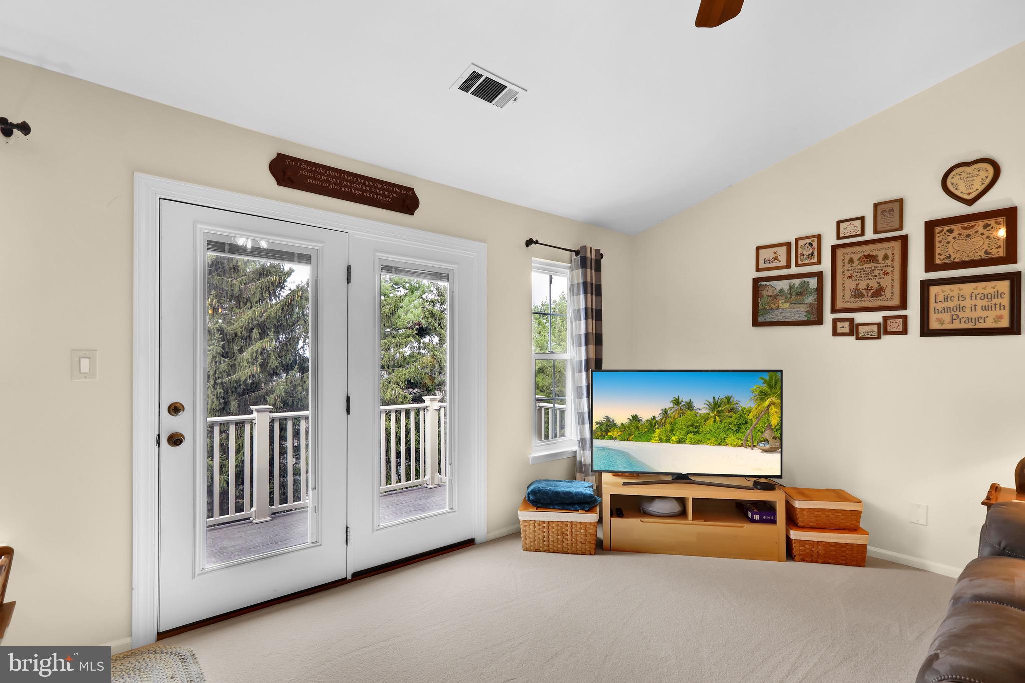 237 North 14th Street Reading, PA 19604 - Photo 4 of 26 a living room with furniture and a flat screen tv