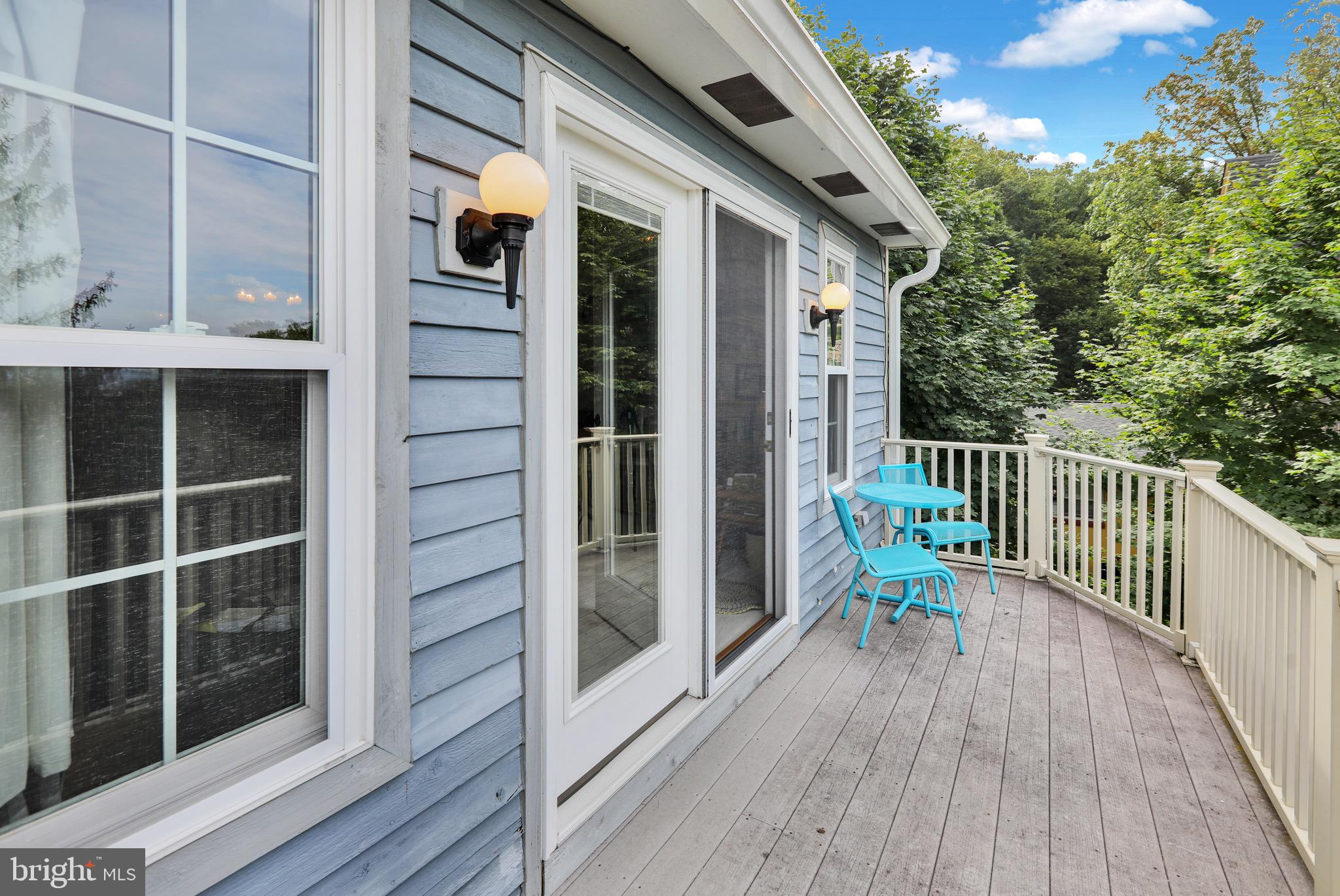 237 North 14th Street Reading, PA 19604 - Photo 5 of 26 a view of a balcony with furniture and wooden floor
