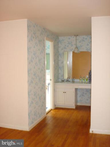 5017 Westport Road Chevy Chase, MD 20815 - Photo 7 of 13 sink and vanity outside master bath