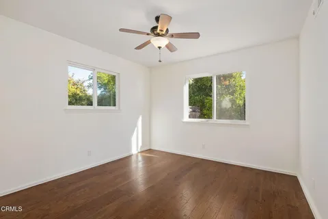 a patio with table and chairs