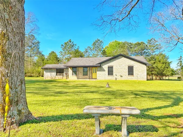 a view of a house with a swimming pool