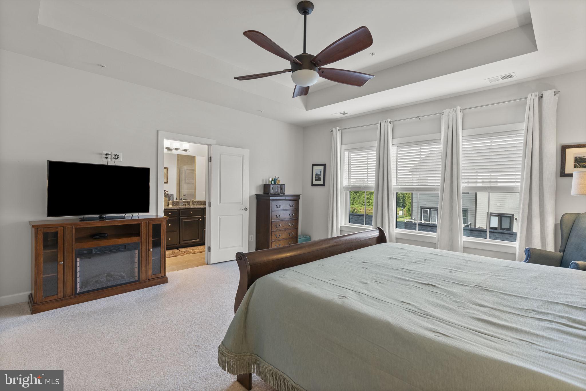 402 Redbridge Street Middle River, MD 21220 - Photo 24 of 49 a bedroom with a bed and a flat screen tv