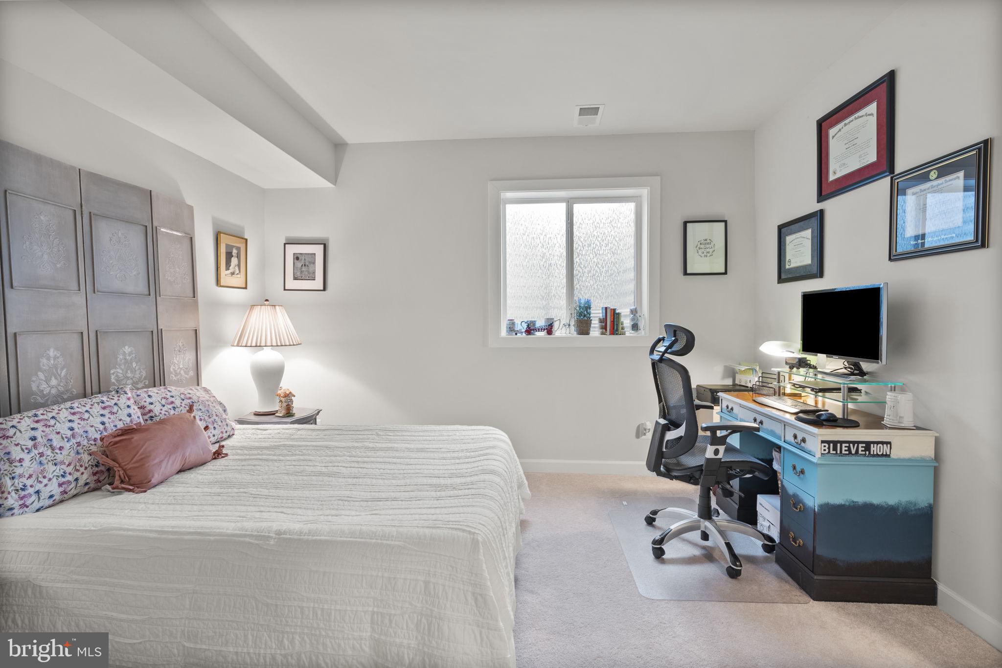 402 Redbridge Street Middle River, MD 21220 - Photo 34 of 49 a bedroom with a workspace