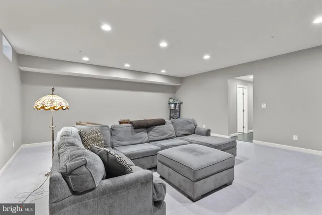 a living room with furniture and a couch