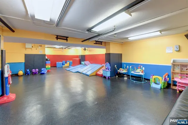 a view of a swimming pool and an outdoor seating