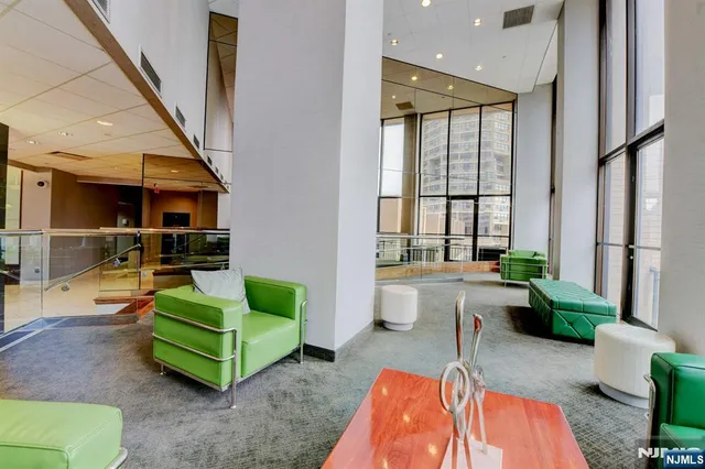 a view of hallway with wooden floor