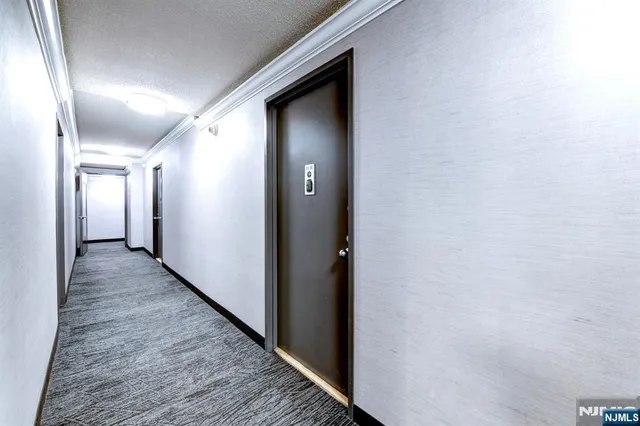 a view of a kitchen with furniture and a window