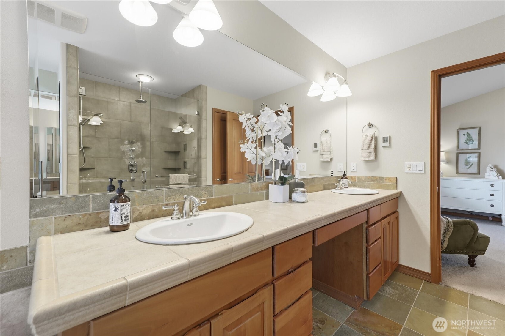 20615 39th Avenue Southeast Bothell, WA 98021 - Photo 19 of 37 a bathroom with a sink double vanity and a mirror