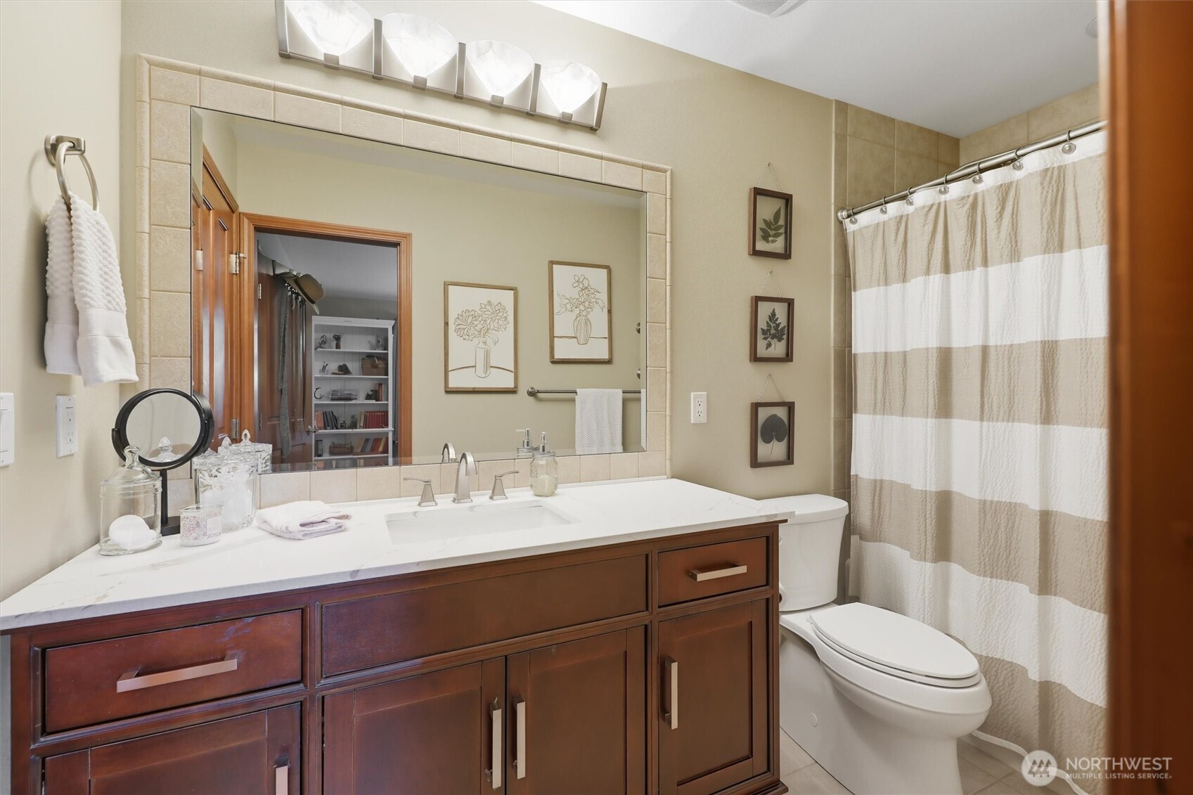 20615 39th Avenue Southeast Bothell, WA 98021 - Photo 25 of 37 a bathroom with a toilet sink and mirror