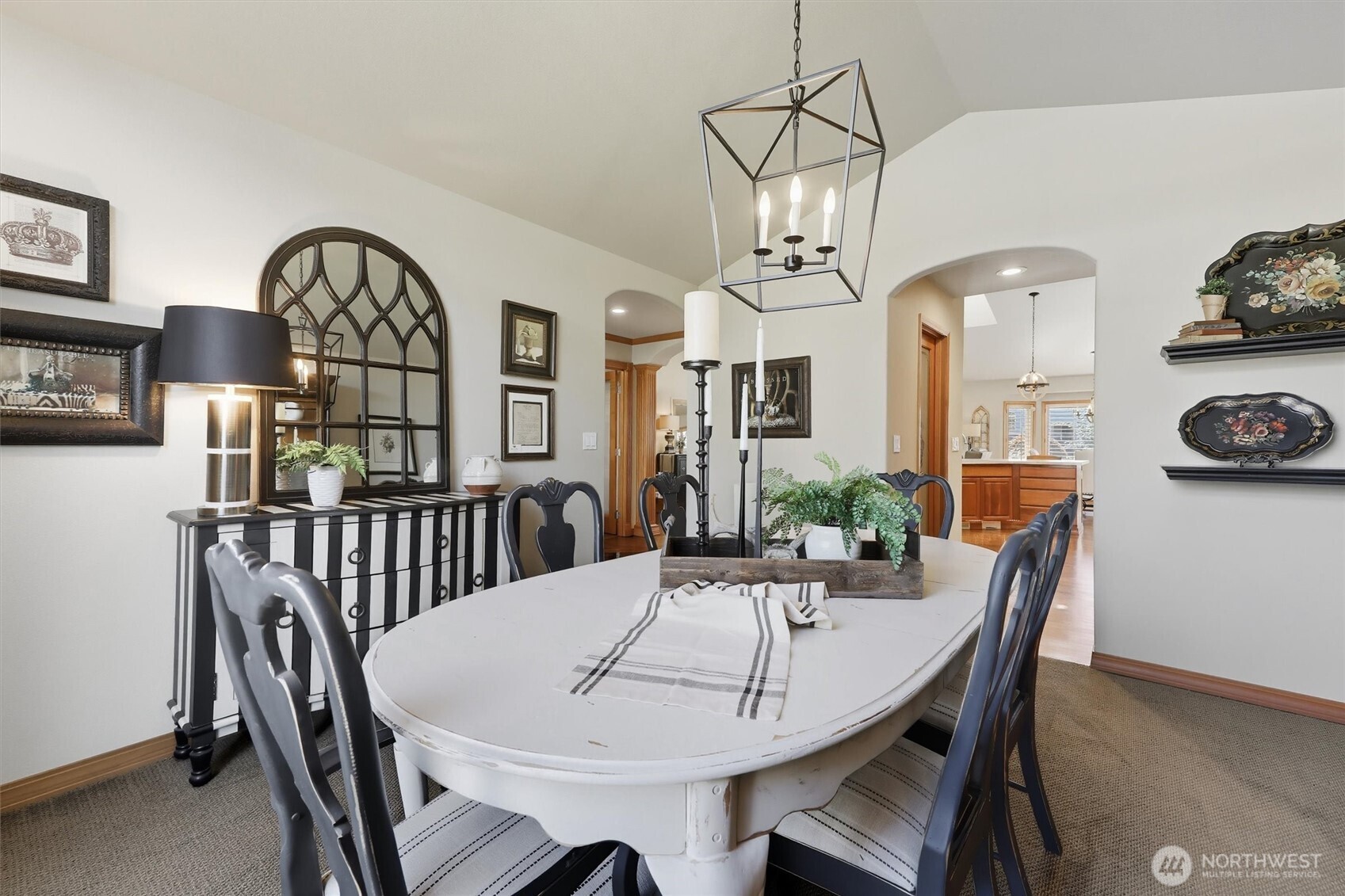 20615 39th Avenue Southeast Bothell, WA 98021 - Photo 10 of 37 a view of a dining room and hall with furniture