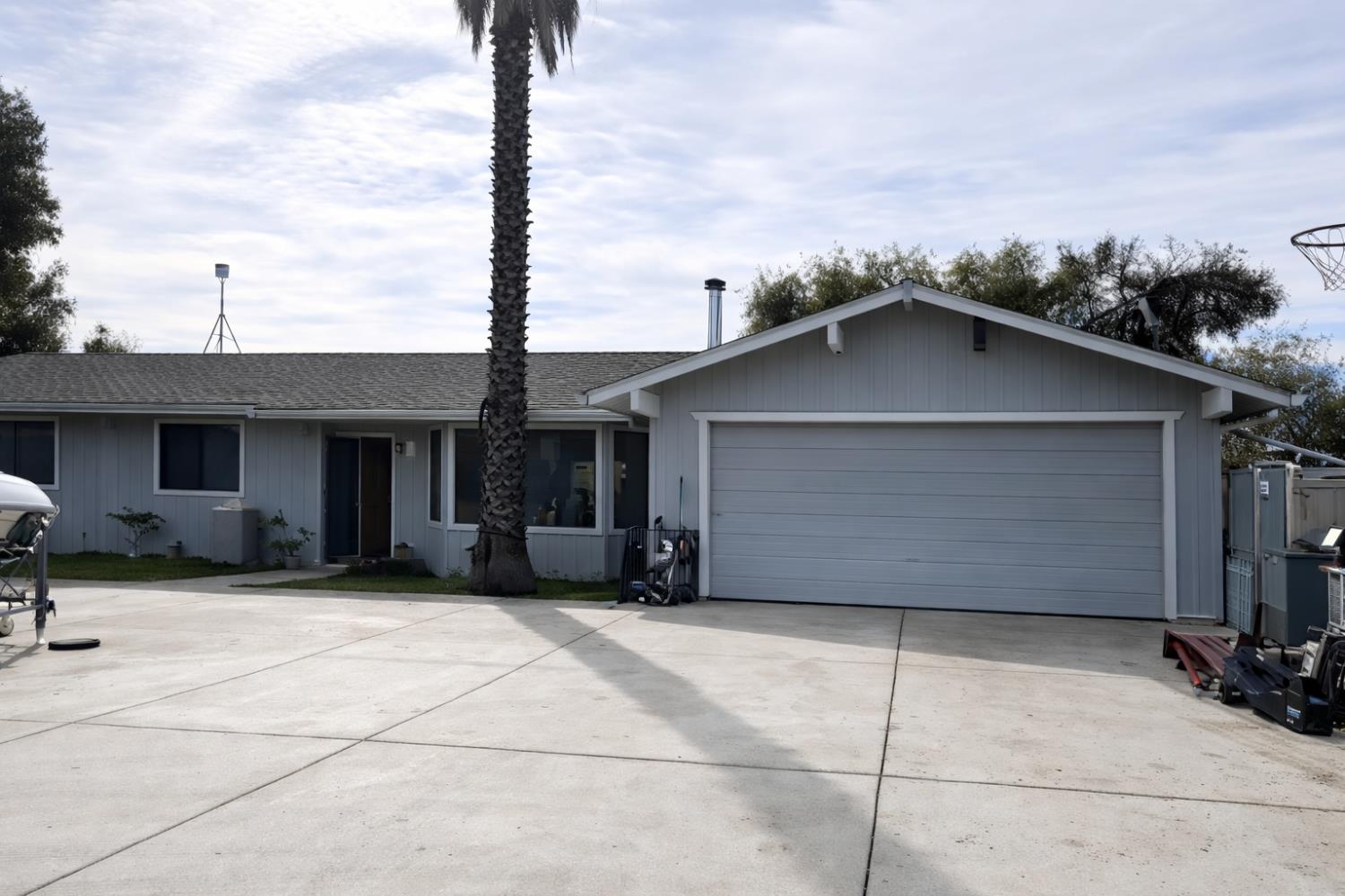 46300 Oonay Nation Road Coarsegold, CA 93614 - Photo 1 of 2 a front view of a house with garage