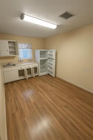 a living room with a flat screen tv