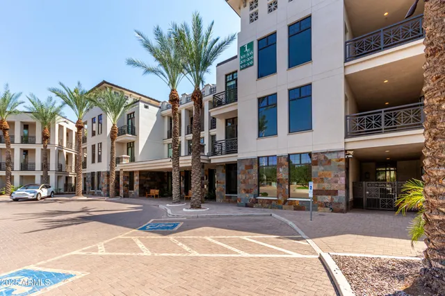 a view of a building with a street