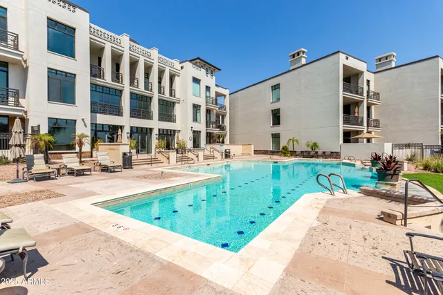 a view of a house with a swimming pool