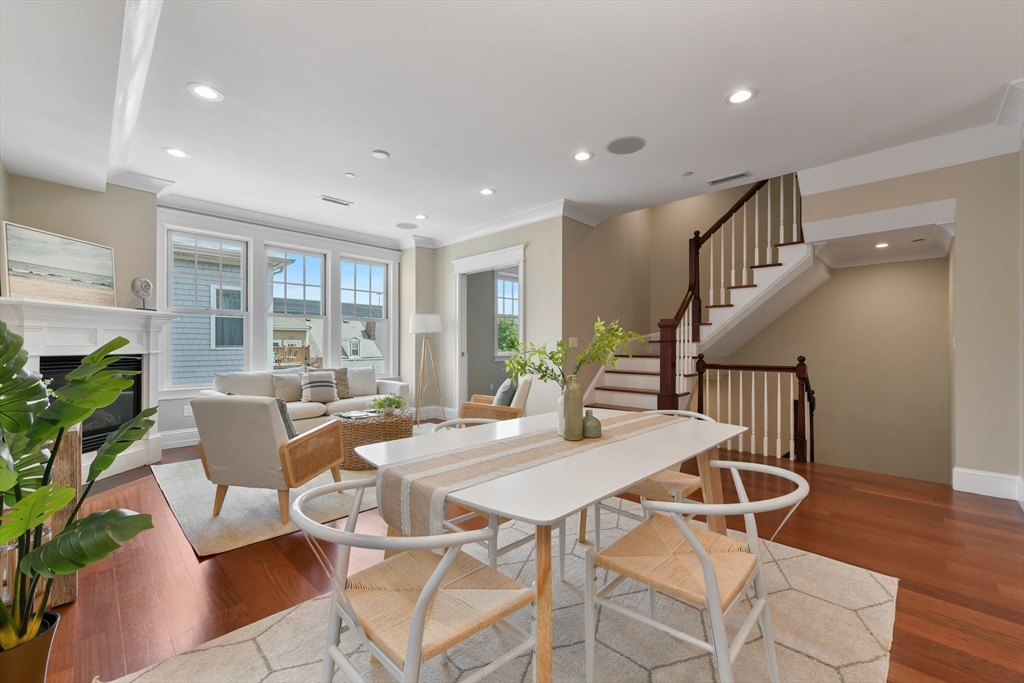 111 Bolton Street, Unit 2 Boston, MA 02127 - Photo 16 of 36 a view of a dining room with furniture window and wooden floor