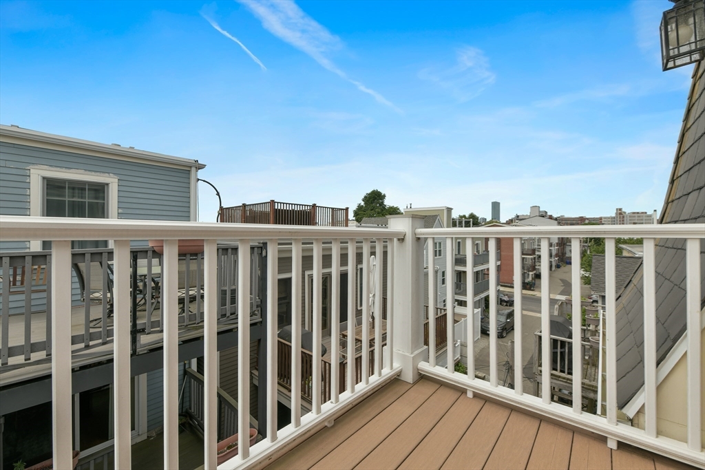 111 Bolton Street, Unit 2 Boston, MA 02127 - Photo 21 of 36 a view of city from a balcony