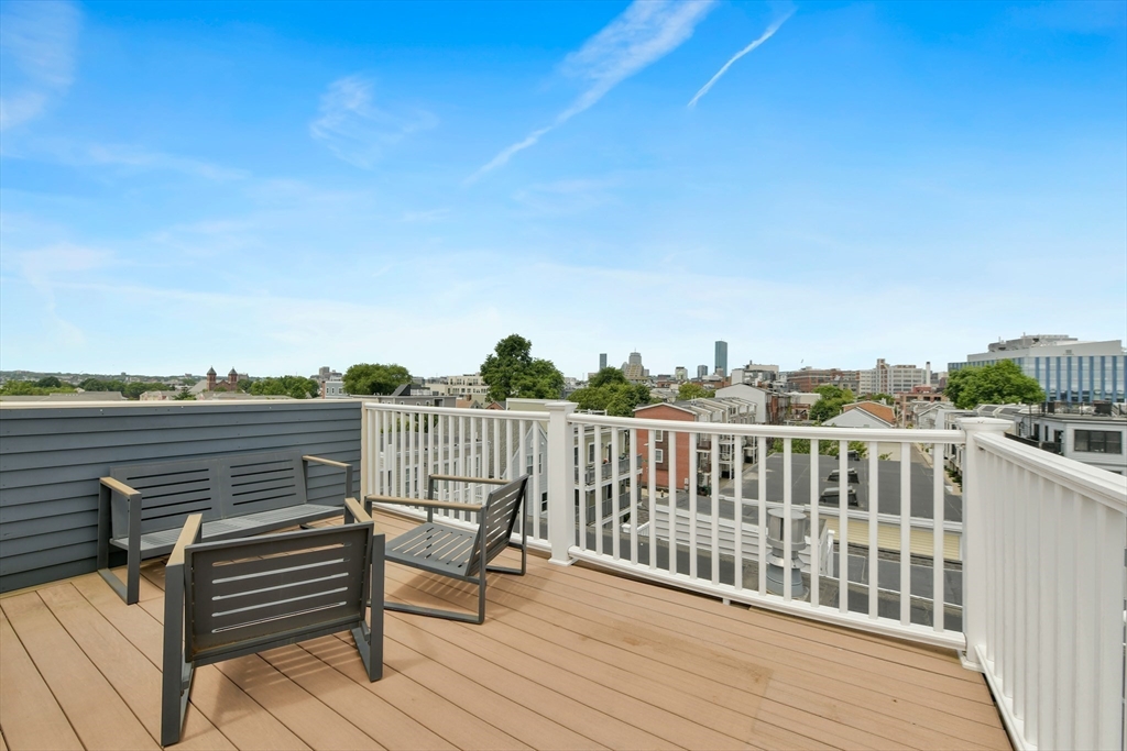111 Bolton Street, Unit 2 Boston, MA 02127 - Photo 30 of 36 a view of a terrace with chairs