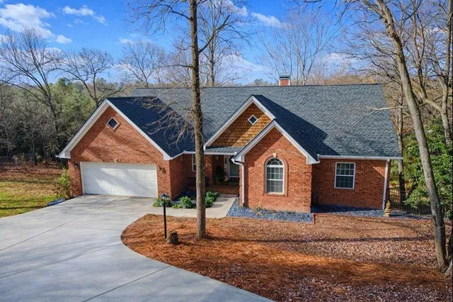 a house with trees in the background
