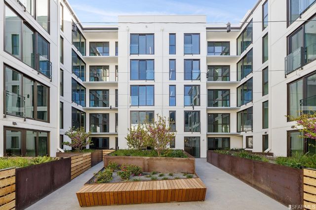 a front view of a building with windows