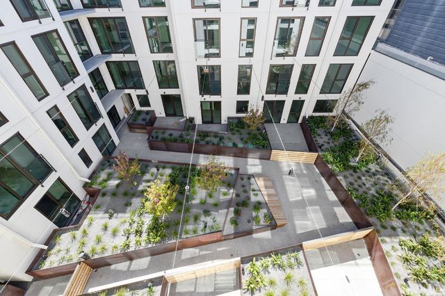 a view of building with yard