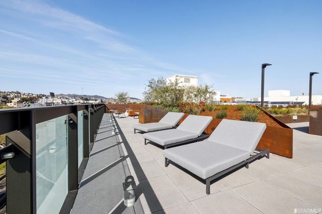 a view of a terrace with chairs
