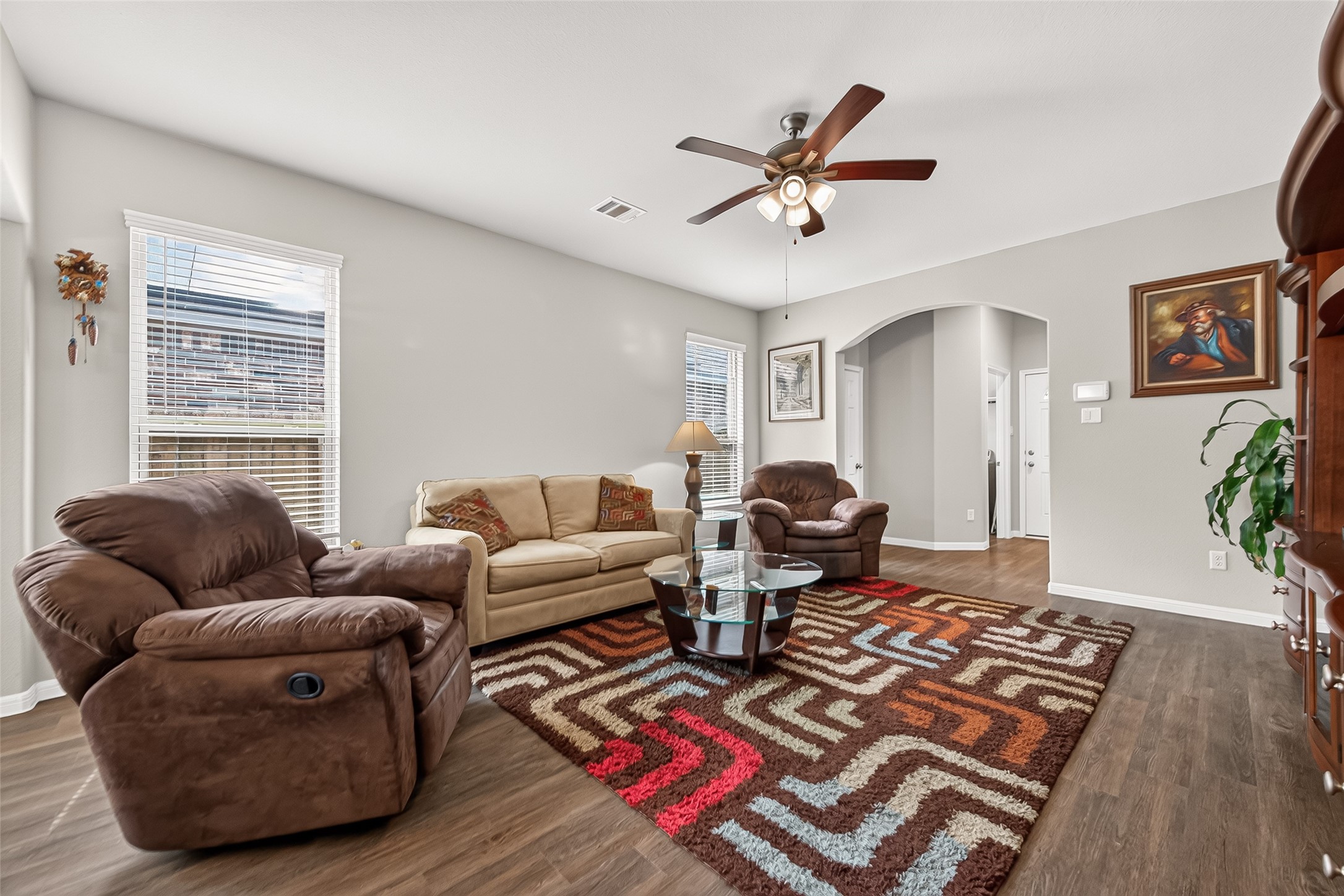 1329 Red Hills Drive Rosharon, TX 77583 - Photo 7 of 27 This inviting living room features neutral walls Notice the arched entry leading to this spacious living room.