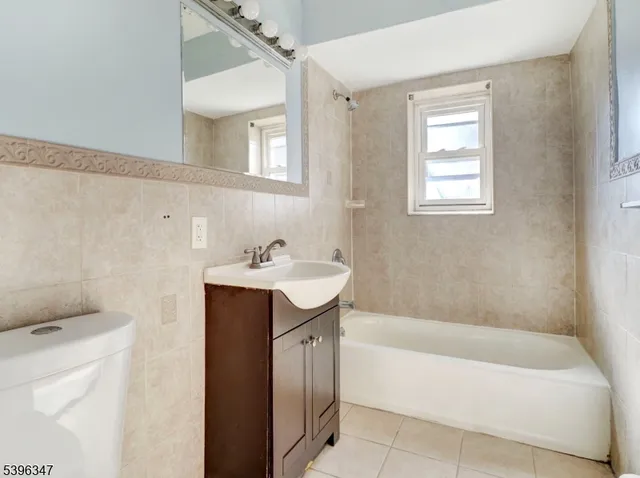 a bathroom with a sink and a bathtub