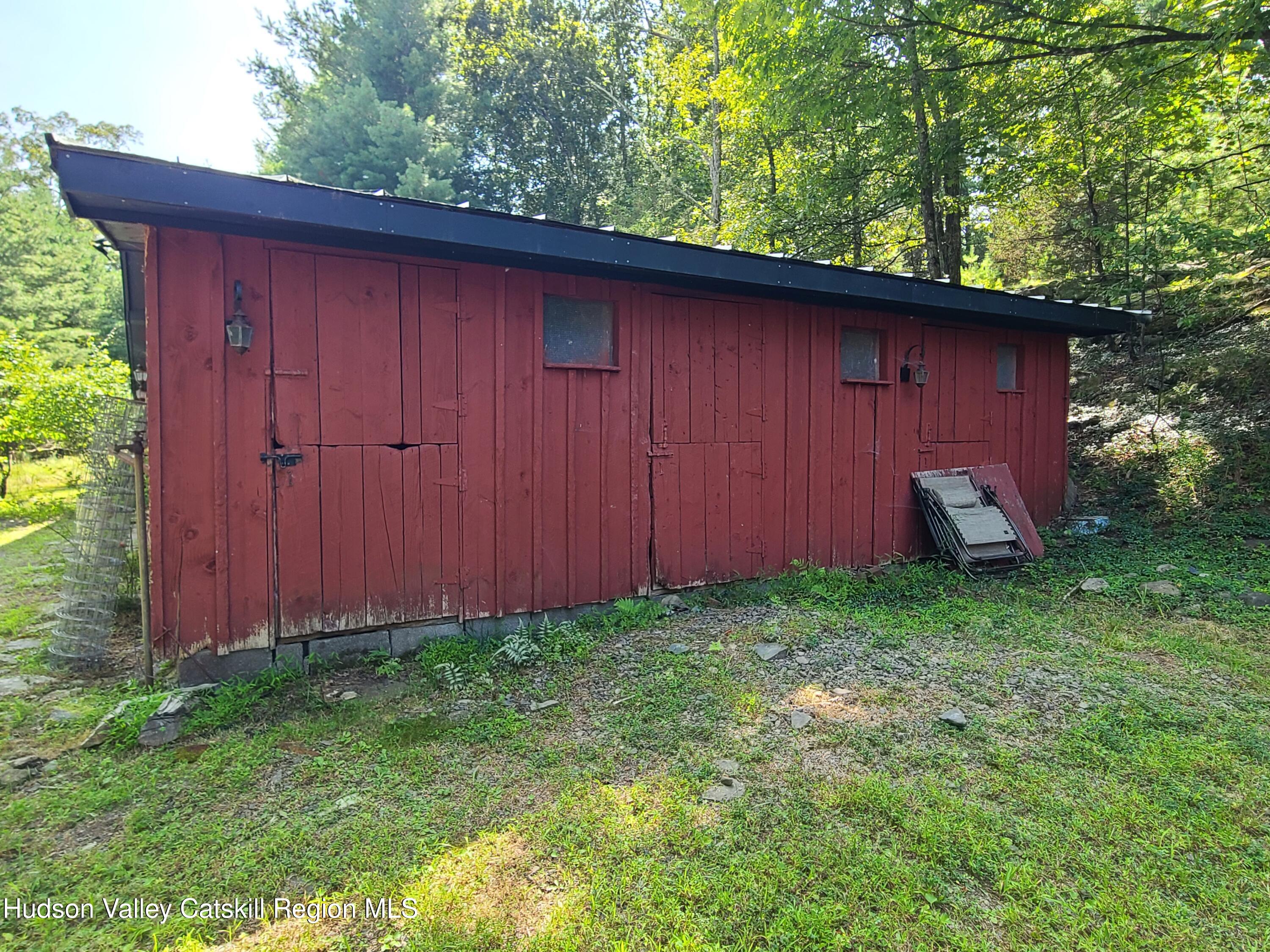 44 Sheldon Hill Road Olivebridge, NY 12461 - Photo 11 of 24 a backyard of a house with lots of green space