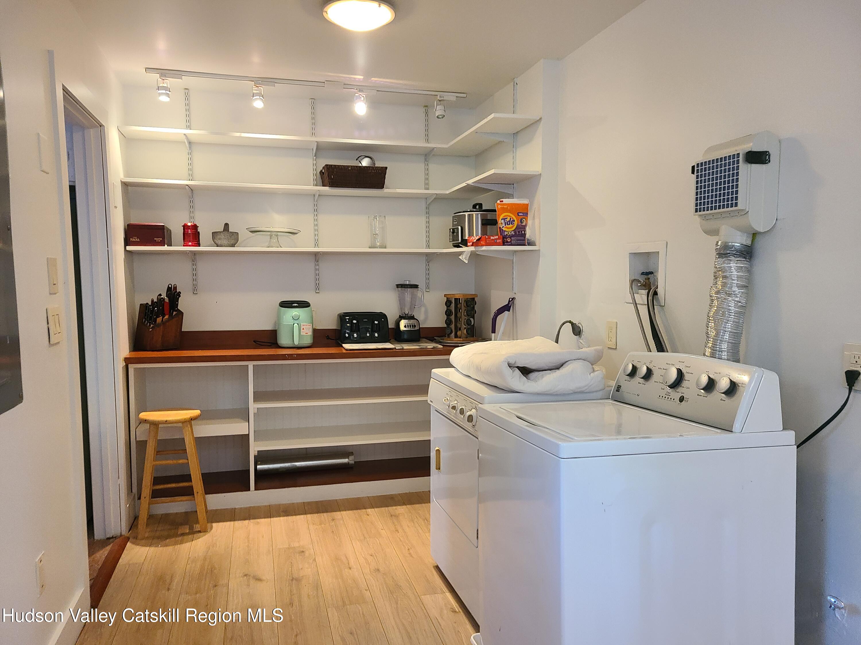 44 Sheldon Hill Road Olivebridge, NY 12461 - Photo 20 of 24 a room with a cabinets and a wooden floor