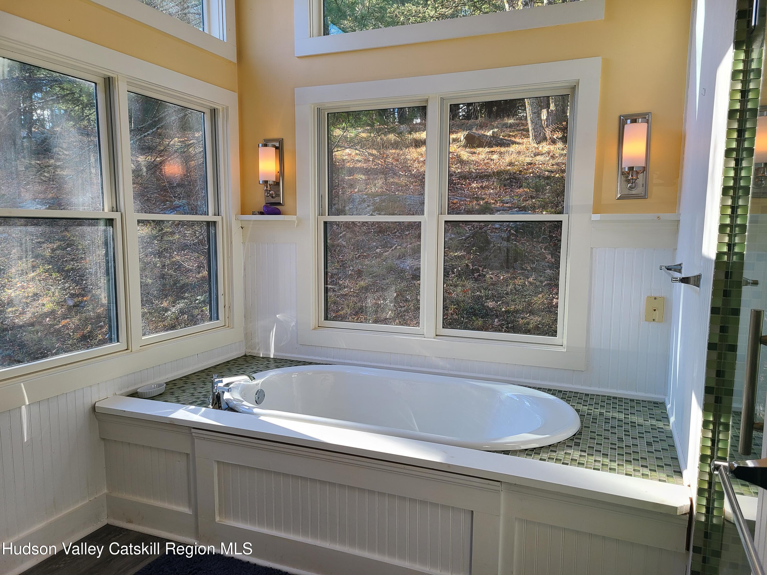 44 Sheldon Hill Road Olivebridge, NY 12461 - Photo 24 of 24 a bathroom with a bathtub and a sink