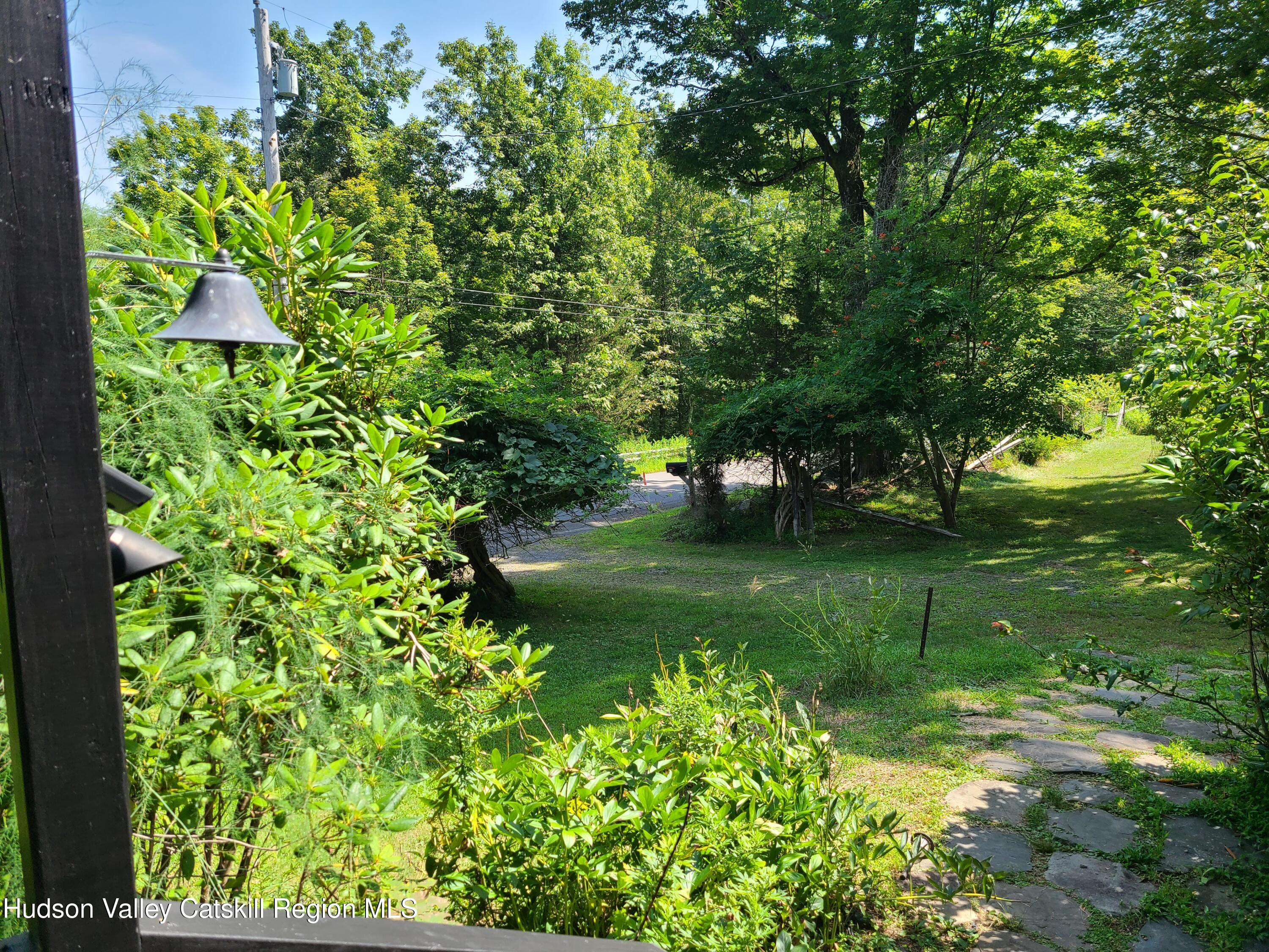 44 Sheldon Hill Road Olivebridge, NY 12461 - Photo 5 of 24 a view of a garden with a lake