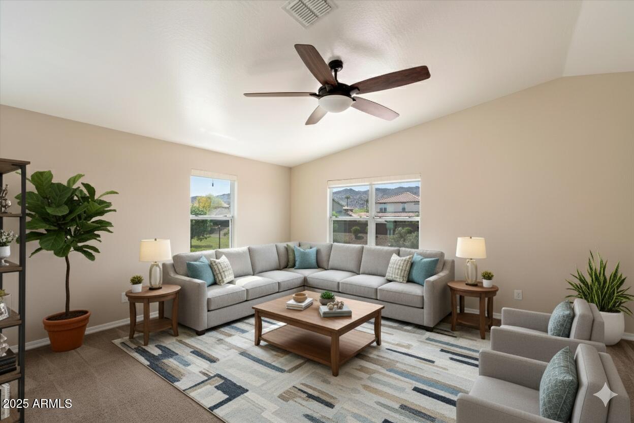 737 East Harwell Road Phoenix, AZ 85042 - Photo 2 of 28 a living room with furniture a window and a potted plant